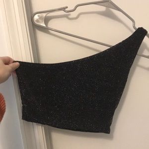 Sparkly black and silver half shoulder top.